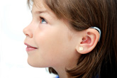 girl with hearing aid